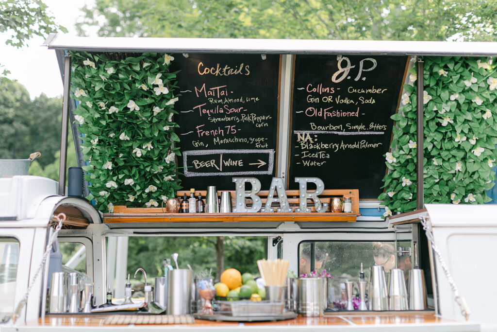 Mobile bar with chalkboard menu at Connecticut wedding reception.
