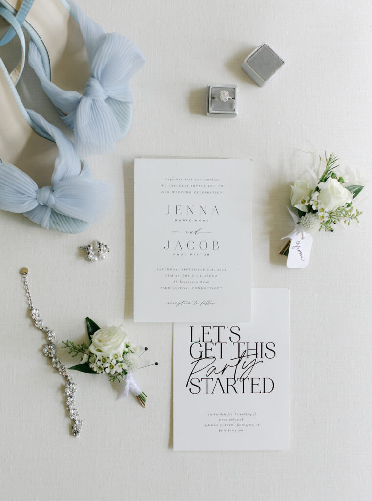 Hillstead Museum wedding flat lay of invitation suite, rings and shoes
