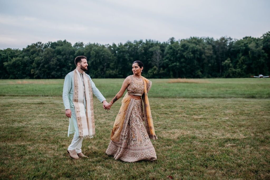 bride an groom at wedding in indian formal dress