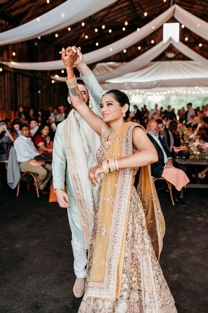 indian-american bride and groom dancing at wedding reception